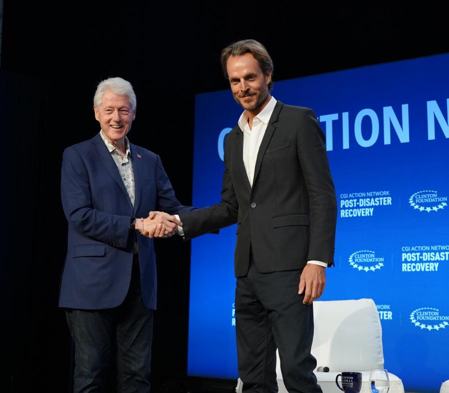 Bill Clinton Jeff Palmer fundador TBL Tourism